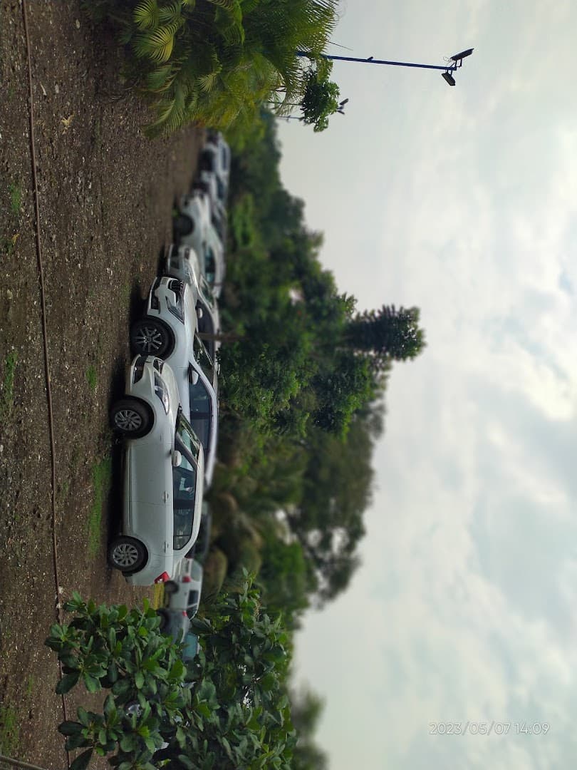 Spacious parking and property entrance area during daytime
